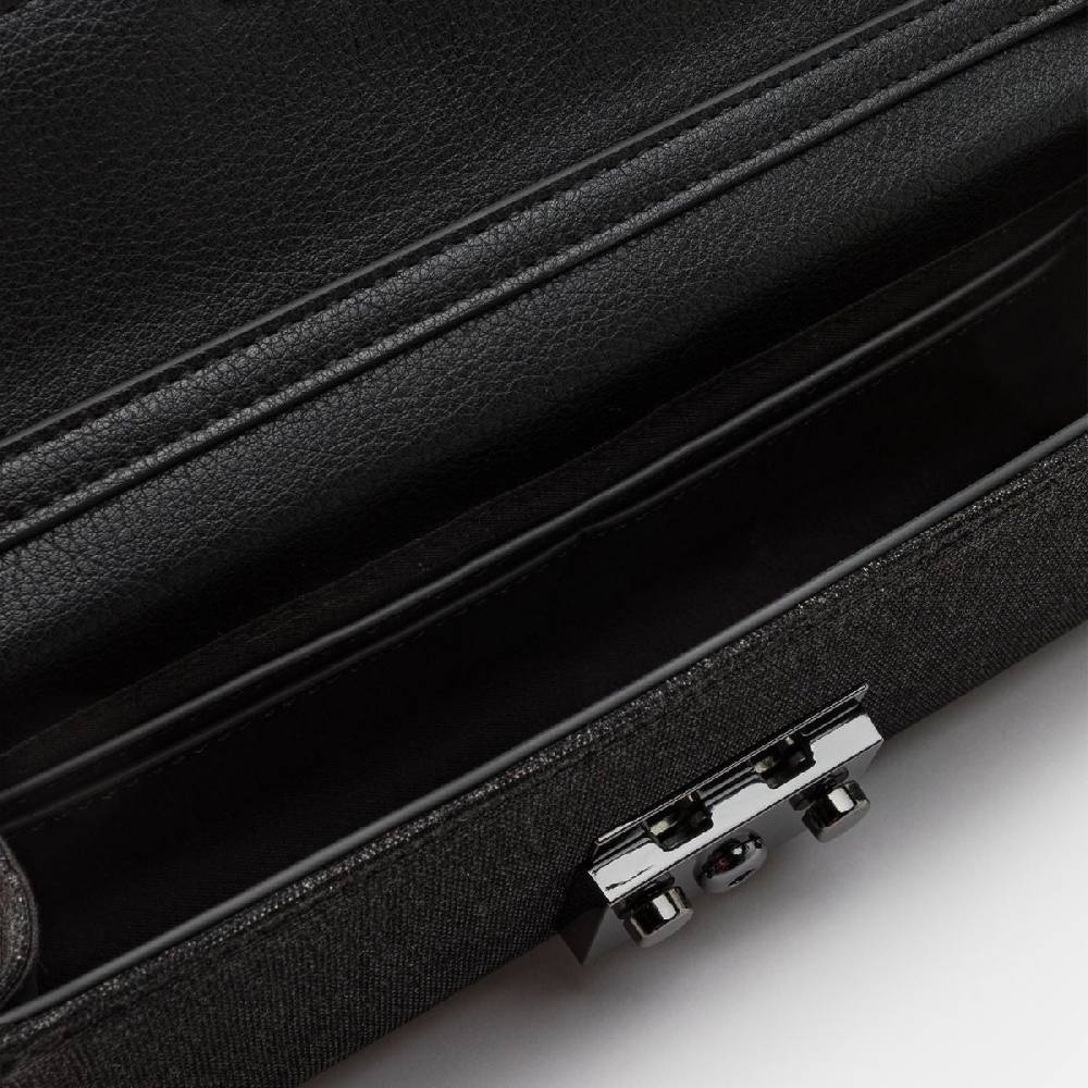 L. Credi Nadi Clutch schwarz Blitzverkäufe