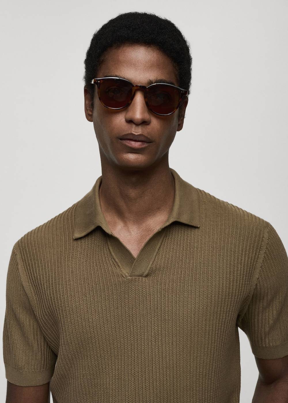 Mango Geripptes Strick-Poloshirt aus Baumwolle Große Rabatte