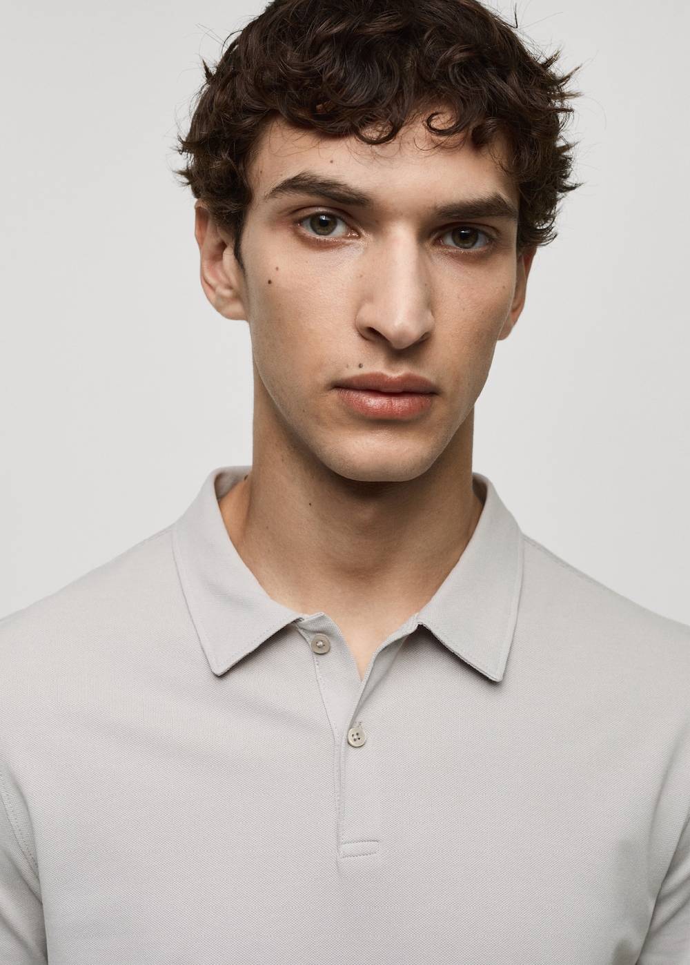 Mango Strukturiertes Slim-Fit-Poloshirt aus Baumwoll-Piqué Exklusivangebot