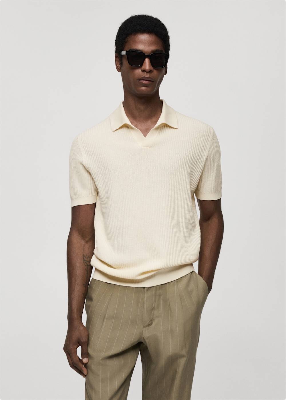Mango Geripptes Strick-Poloshirt aus Baumwolle