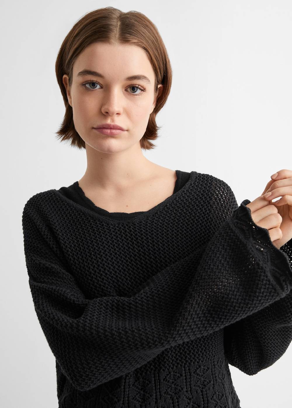 Mango Lochstrickpullover mit V-Ausschnitt Speichern exportieren