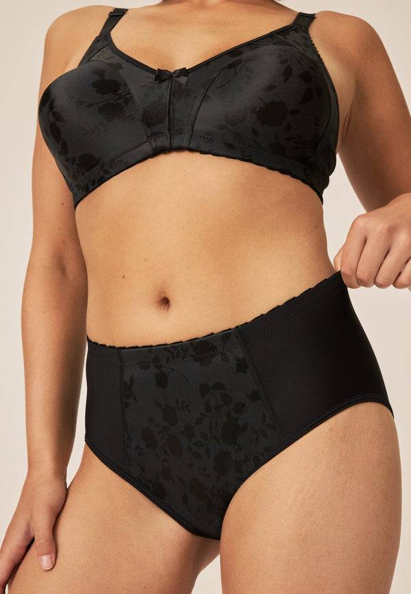 Naturana Minimizer Slip mit Blumenmuster - Schwarz Begrenzte Freigabe