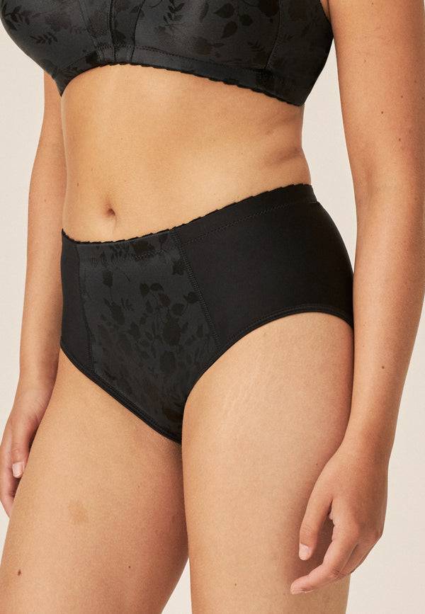 Naturana Minimizer Slip mit Blumenmuster - Schwarz Begrenzte Freigabe